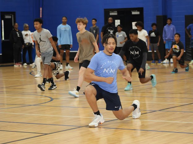 A moment from the Nate McMillan Mentoring Camp