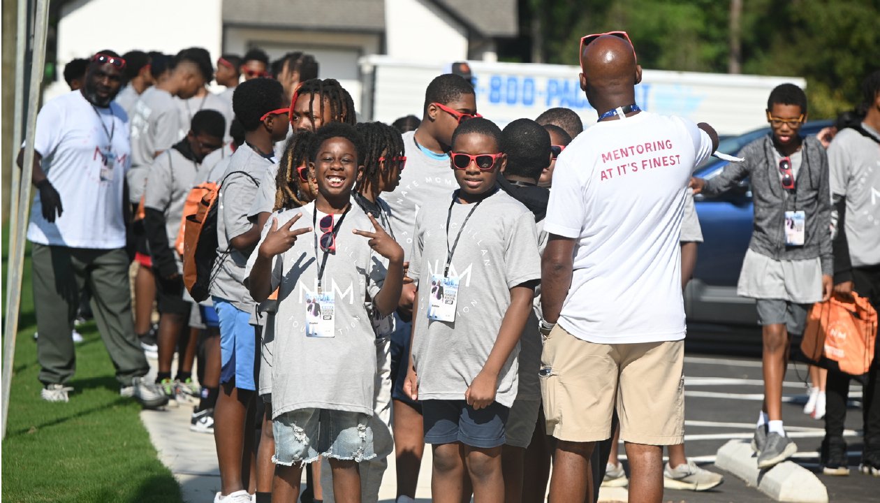 Campers and mentors gathered together at the Nate McMillan Mentoring Camp